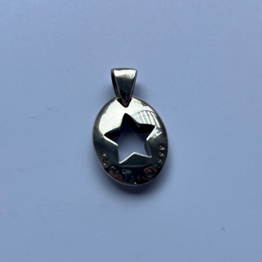 Tiffany and Co. star cut out pendant